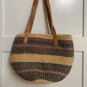 Woven bag with leather straps